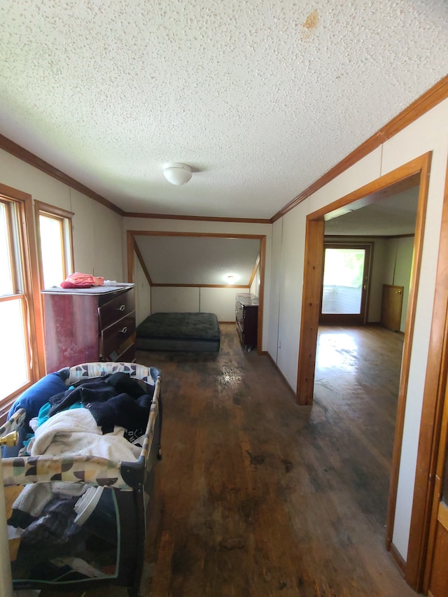 1814 Jasmine Ave, Flint, MI 48503 - bedroom featuring ornamental molding, a textured ceiling, and wood finished floors