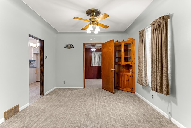 1281 Empire Ave, Lincoln Park, MI 48146 - carpeted empty room with ceiling fan and baseboards
