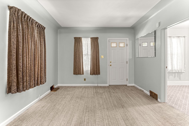 1281 Empire Ave, Lincoln Park, MI 48146 - carpeted entrance foyer with plenty of natural light and baseboards