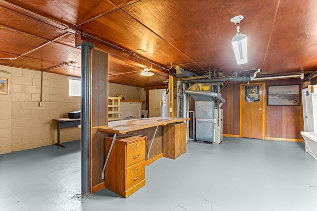 1281 Empire Ave, Lincoln Park, MI 48146 - below grade area with heating unit, concrete block wall, and water heater