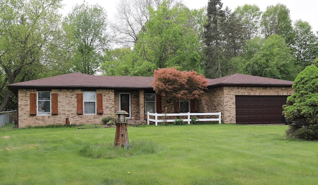 6452 Brian Circle Ln, Burton, MI 48509 - ranch-style house with brick siding and an attached garage