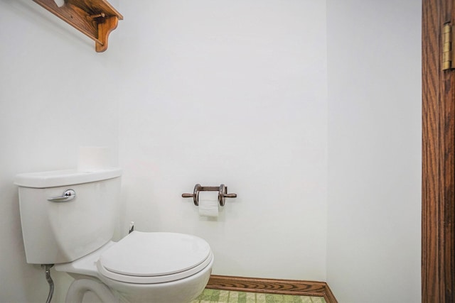 200 Brink St, Grant, MI 49327 - bathroom featuring toilet and baseboards