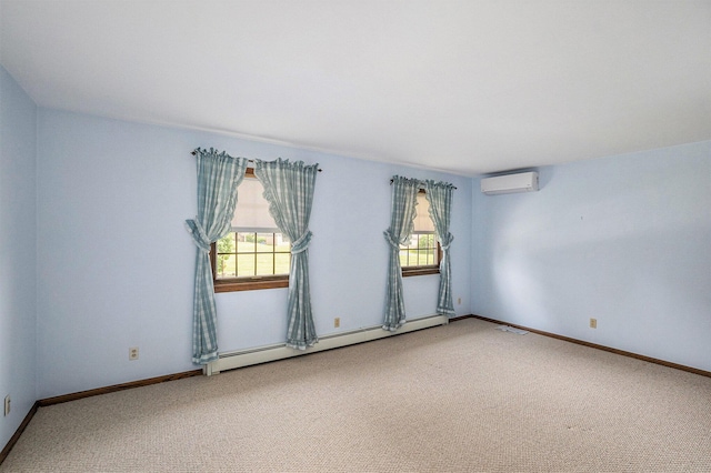 200 Brink St, Grant, MI 49327 - carpeted spare room featuring an AC wall unit, a baseboard heating unit, and baseboards