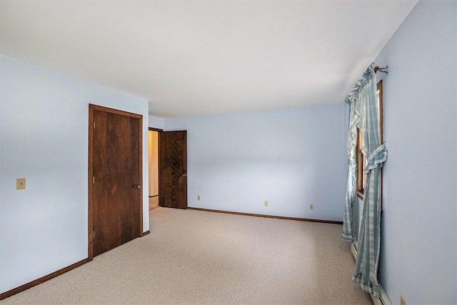 200 Brink St, Grant, MI 49327 - unfurnished room featuring carpet floors and baseboards