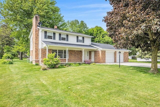200 Brink St, Grant, MI 49327 - traditional-style home with a chimney, a garage, concrete driveway, brick siding, and a front lawn