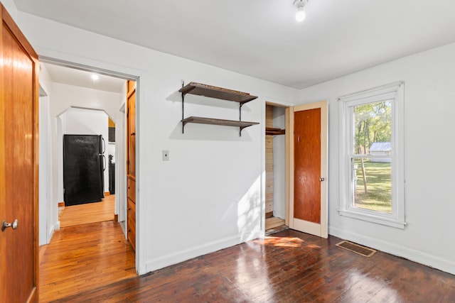 434 Walnut St, Howard City, MI 49329 - unfurnished room featuring hardwood / wood-style floors and baseboards