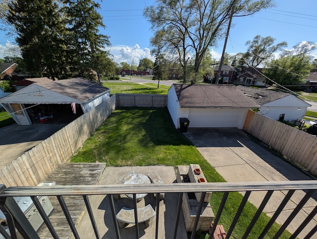 9864 E Outer Dr, Detroit, MI 48224 - view of yard with an outbuilding and a garage