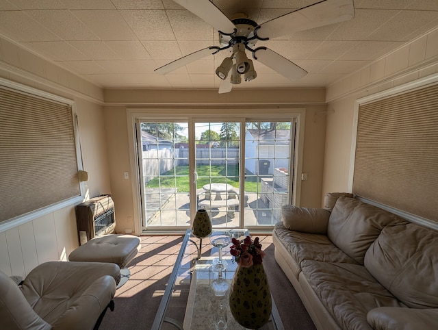 9864 E Outer Dr, Detroit, MI 48224 - living area featuring ceiling fan and a decorative wall