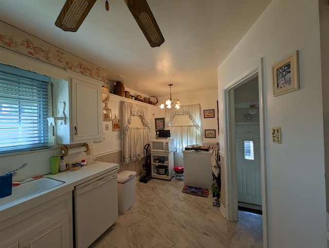 9864 E Outer Dr, Detroit, MI 48224 - kitchen with white appliances, white cabinets, a chandelier, a sink, and light countertops