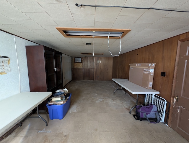 9864 E Outer Dr, Detroit, MI 48224 - basement with wooden walls and light flooring