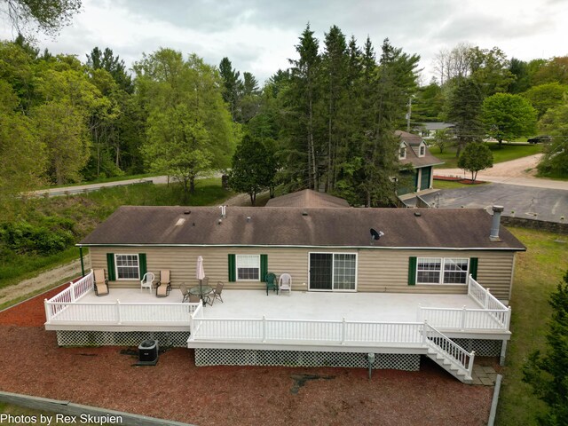 5705 Centerline Rd, Newaygo, MI 49337 - rear view of property with a wooden deck