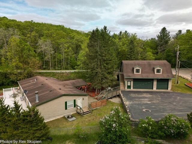 5705 Centerline Rd, Newaygo, MI 49337 - view from above of property featuring a heavily wooded area
