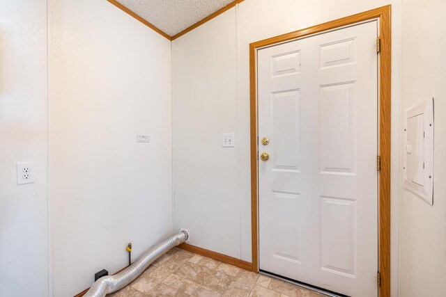 5705 Centerline Rd, Newaygo, MI 49337 - laundry room featuring ornamental molding, electric panel, electric dryer hookup, and baseboards