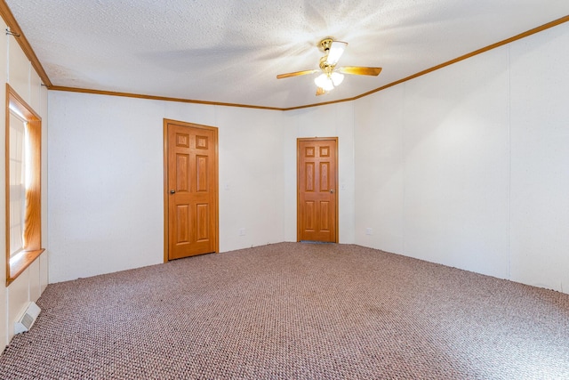 5705 Centerline Rd, Newaygo, MI 49337 - carpeted empty room featuring crown molding, a ceiling fan, and a textured ceiling