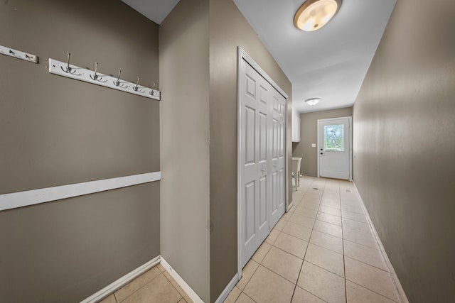 18080 Parke Ln, Grosse Ile, MI 48138 - hall with baseboards and light tile patterned floors