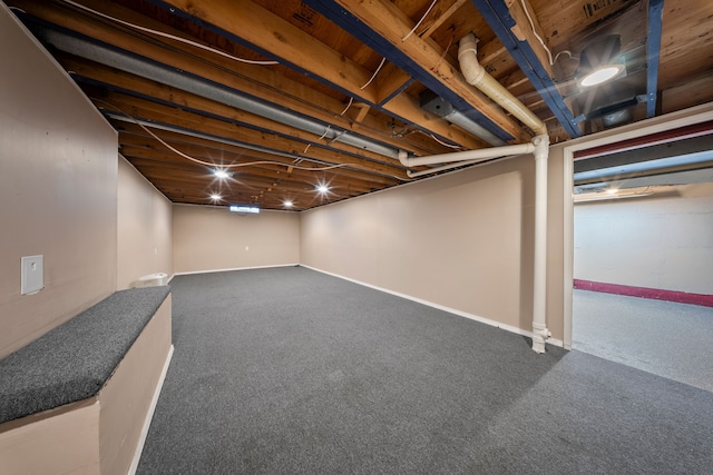 18080 Parke Ln, Grosse Ile, MI 48138 - finished below grade area featuring carpet and baseboards