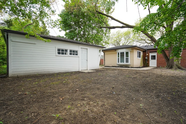 30644 Hayes Rd, Roseville, MI 48066 - rear view of property with an outdoor structure