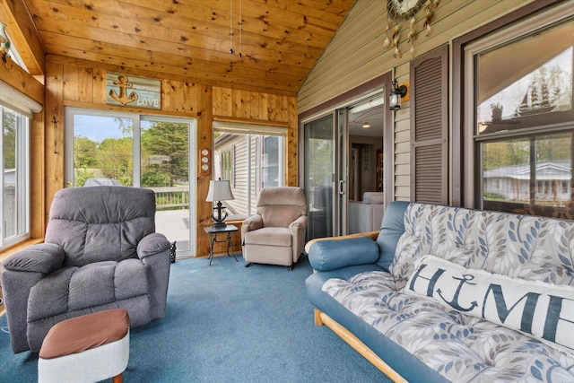204 Crockett Dr, Quincy, MI 49082 - living room with vaulted ceiling, wooden walls, wooden ceiling, and carpet