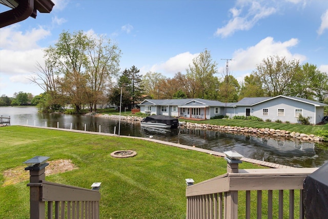 204 Crockett Dr, Quincy, MI 49082 - view of grassy yard with a water view and an outdoor fire pit