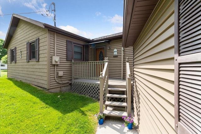 204 Crockett Dr, Quincy, MI 49082 - view of home's exterior with a lawn