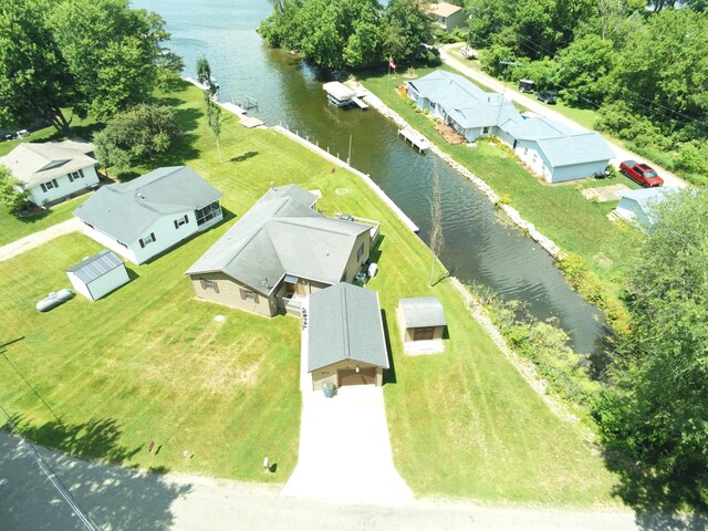 204 Crockett Dr, Quincy, MI 49082 - aerial perspective of suburban area with a large body of water