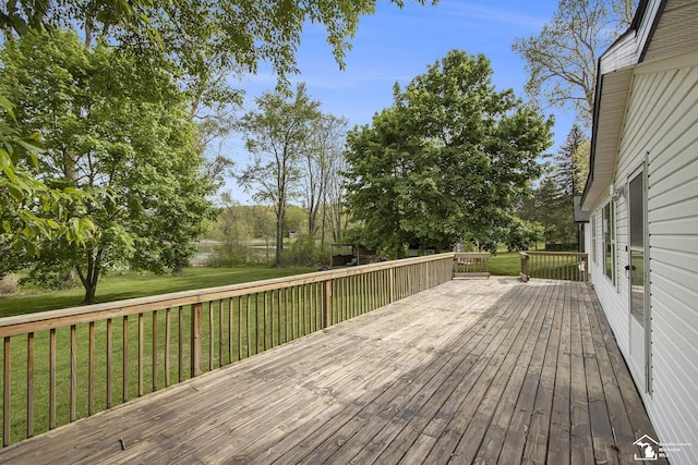 635 Pokey Dr, Hastings, MI 49058 - wooden deck with a lawn