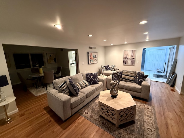 21140 Winchester St, Southfield, MI 48076 - living area with wood finished floors, recessed lighting, and baseboards