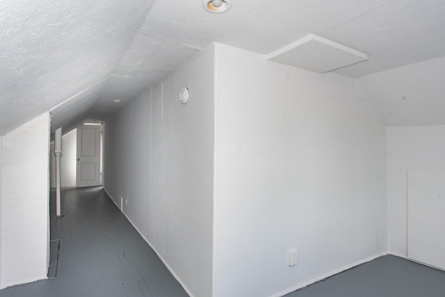 additional living space with vaulted ceiling