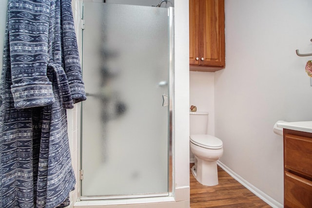 2454 Midvale Ave, Ypsilanti, MI 48197 - full bathroom with a shower stall, wood finished floors, and vanity
