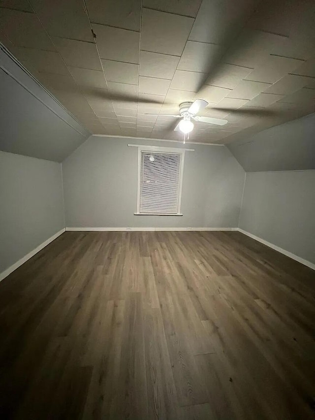 939 Baraga St NE, Grand Rapids, MI 49503 - bonus room with lofted ceiling, baseboards, a ceiling fan, and wood finished floors