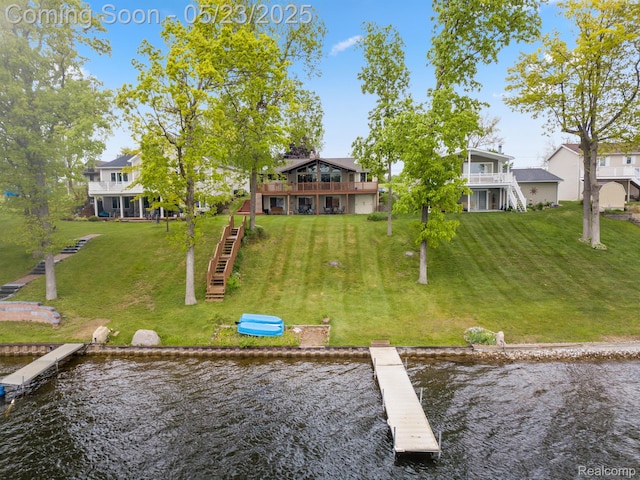 13953 Grandpoint Dr, Cement City, MI 49233 - dock featuring a water view and a yard