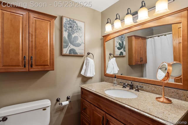13953 Grandpoint Dr, Cement City, MI 49233 - bathroom with toilet, vanity, and a shower with curtain