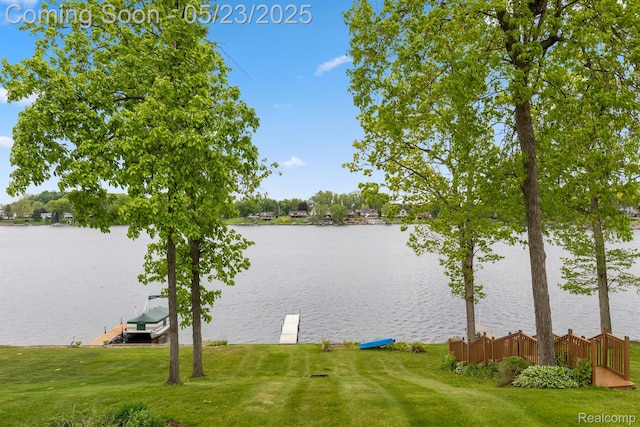 13953 Grandpoint Dr, Cement City, MI 49233 - water view featuring a dock