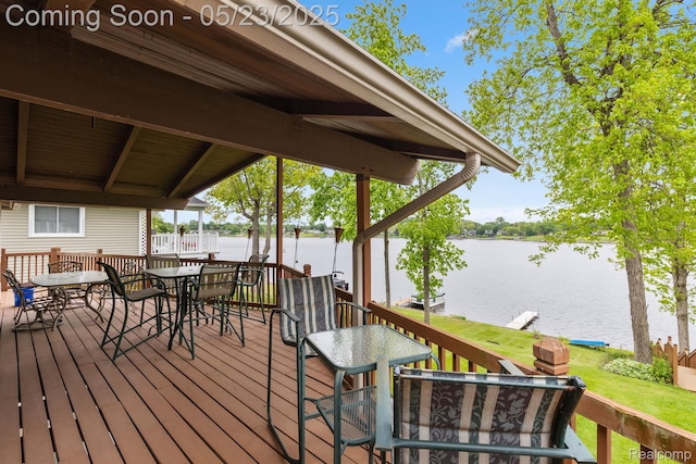 13953 Grandpoint Dr, Cement City, MI 49233 - wooden terrace featuring a water view and outdoor dining space
