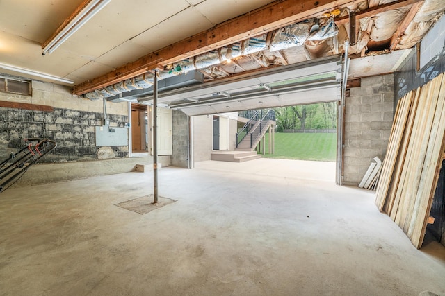 garage featuring concrete block wall