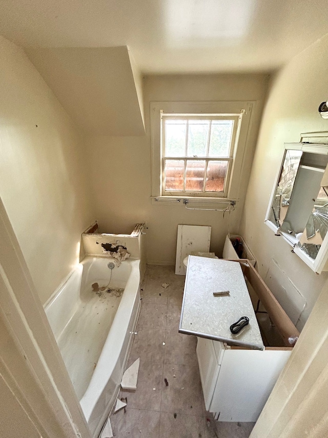 2317 Flushing Rd, Flint, MI 48504 - bathroom with a garden tub