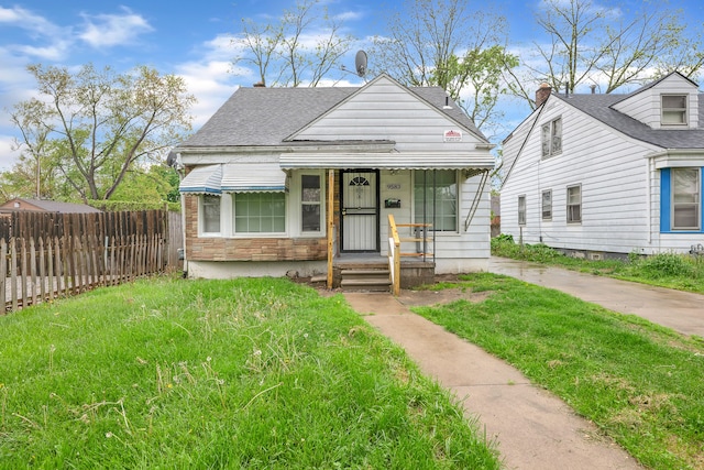 9583 Stahelin Ave, Detroit, MI 48228 - view of front of house with a shingled roof