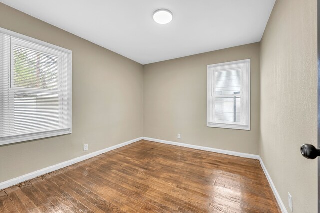 9583 Stahelin Ave, Detroit, MI 48228 - unfurnished room featuring hardwood / wood-style floors and baseboards