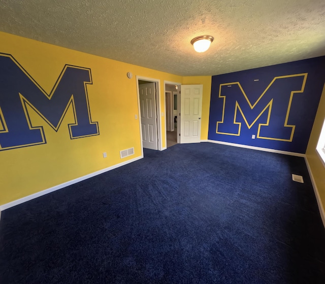 5734 108th Ave, Pullman, MI 49450 - unfurnished room featuring a textured ceiling, baseboards, and carpet floors