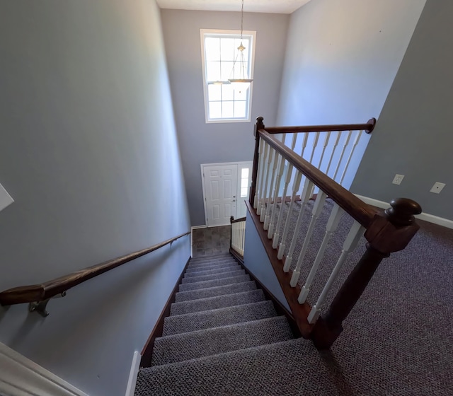 5734 108th Ave, Pullman, MI 49450 - staircase with carpet floors and baseboards