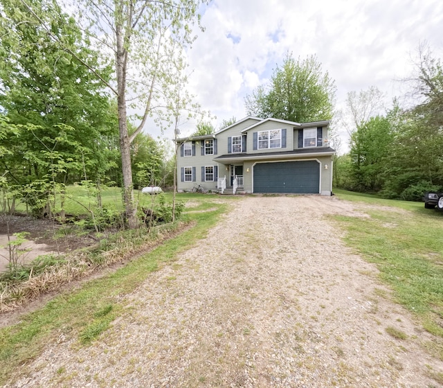 5734 108th Ave, Pullman, MI 49450 - view of front of house with driveway and an attached garage