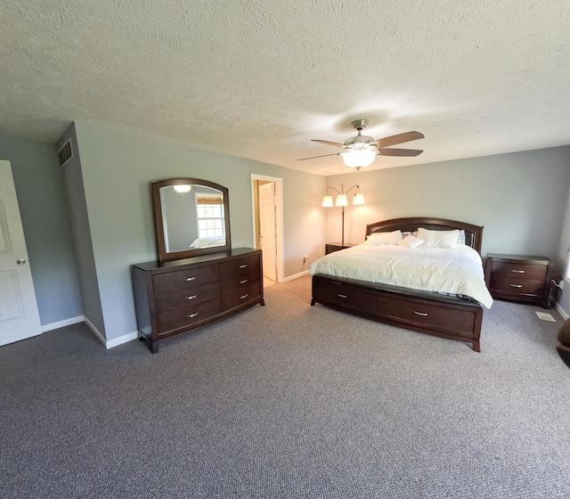 5734 108th Ave, Pullman, MI 49450 - carpeted bedroom featuring baseboards, a textured ceiling, and a ceiling fan