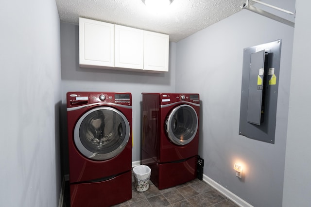 5734 108th Ave, Pullman, MI 49450 - laundry area with cabinet space, electric panel, separate washer and dryer, and a textured ceiling