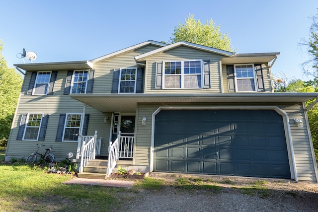 5734 108th Ave, Pullman, MI 49450 - view of front of home with driveway and an attached garage