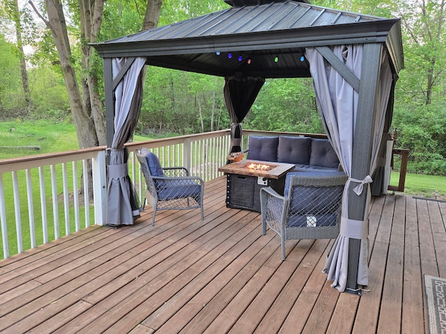 5734 108th Ave, Pullman, MI 49450 - wooden terrace with an outdoor fire pit, a gazebo, and a lawn