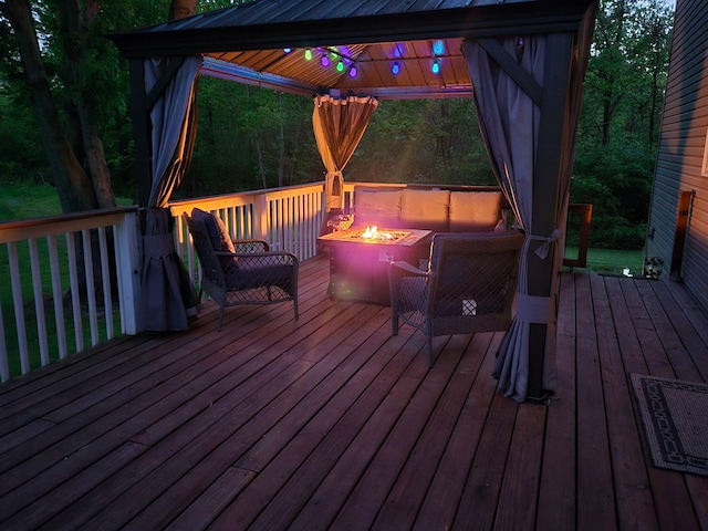 5734 108th Ave, Pullman, MI 49450 - wooden terrace featuring an outdoor fire pit and a gazebo