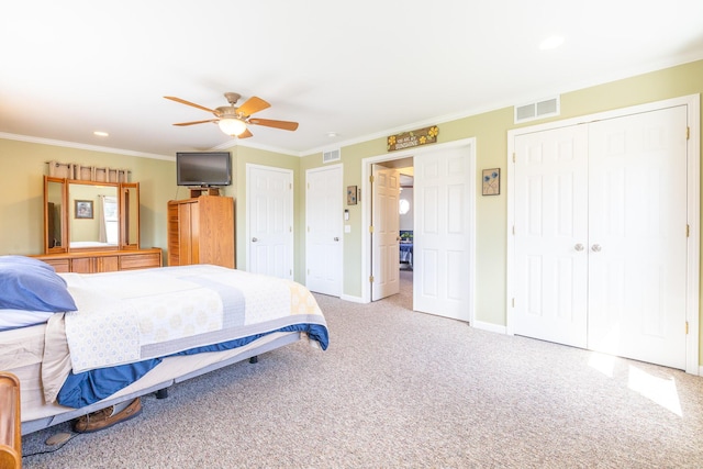1719 Center St, Carleton, MI 48117 - carpeted bedroom featuring crown molding, two closets, recessed lighting, baseboards, and ceiling fan