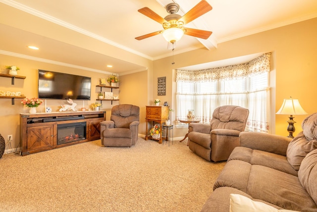 1719 Center St, Carleton, MI 48117 - carpeted living room featuring ceiling fan, ornamental molding, baseboards, and a glass covered fireplace