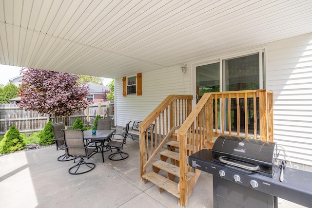 1719 Center St, Carleton, MI 48117 - view of patio with fence, outdoor dining area, and area for grilling
