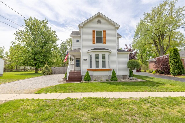 1719 Center St, Carleton, MI 48117 - view of front of property featuring a front yard and driveway